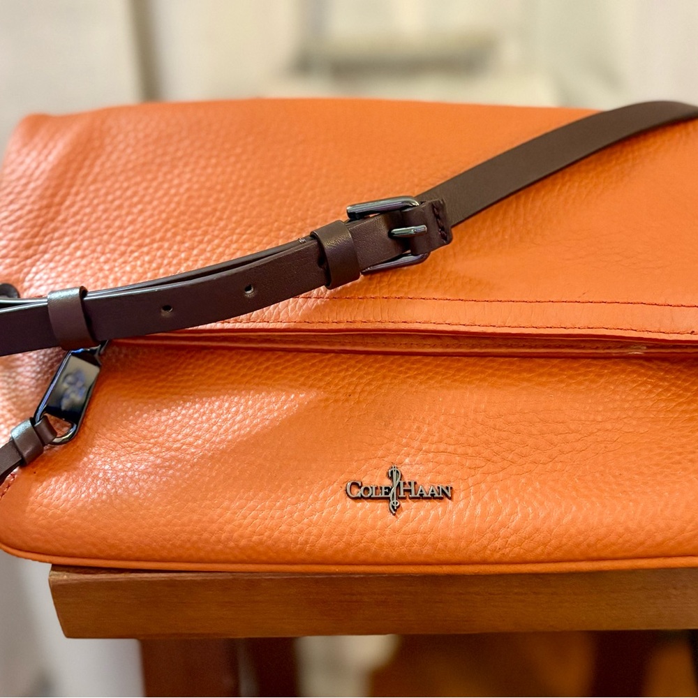 Cole Haan women’s Vibrant Orange messenger/clutch Bag